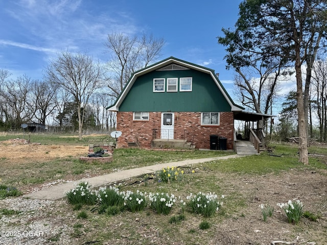 view of home's exterior featuring brick siding