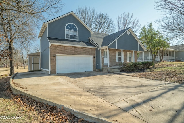 view of front of home with brick siding, a porch, roof with shingles, a garage, and driveway