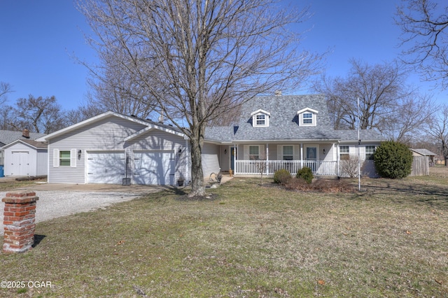 cape cod home with a front yard, roof with shingles, gravel driveway, a porch, and a garage