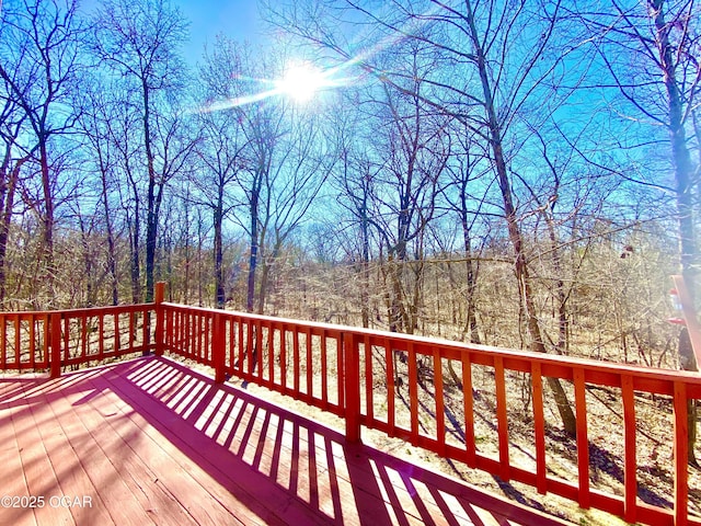 deck with a forest view