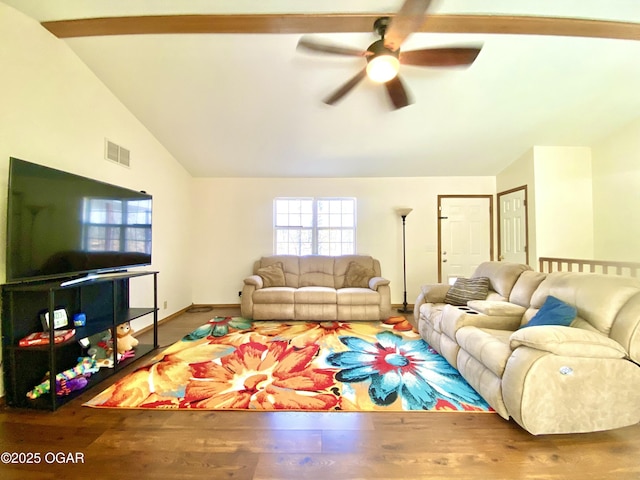 living area featuring a ceiling fan, vaulted ceiling, wood finished floors, and visible vents