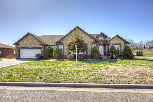 view of front of property with stone siding, a front lawn, concrete driveway, and a garage