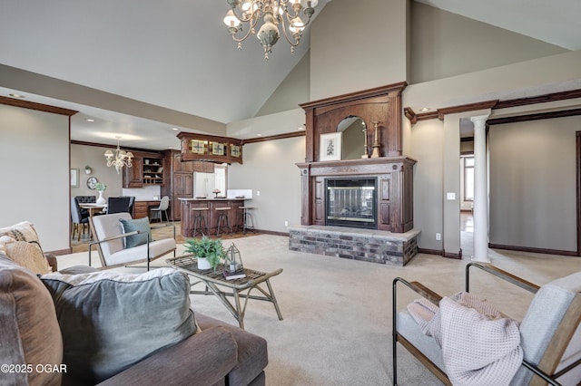 living room with high vaulted ceiling, a notable chandelier, baseboards, and light carpet