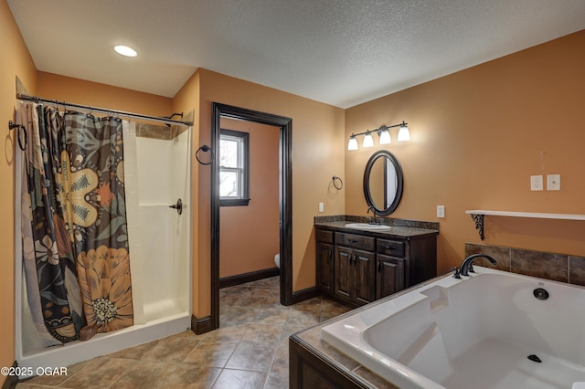 full bath featuring a garden tub, toilet, a textured ceiling, a shower with shower curtain, and vanity