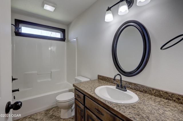 full bathroom featuring toilet, vanity, and  shower combination