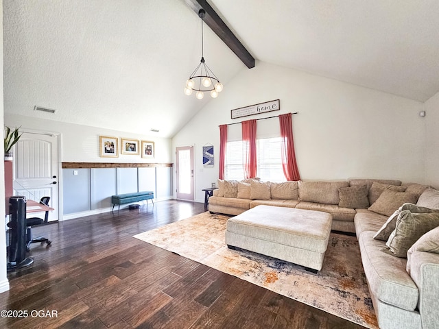 living area featuring wood finished floors, visible vents, high vaulted ceiling, an inviting chandelier, and beam ceiling