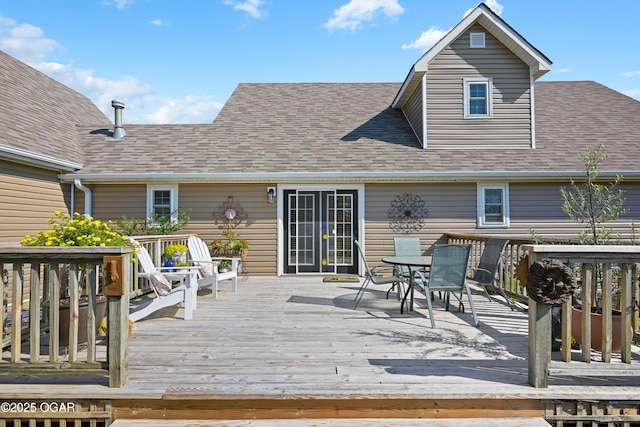 deck featuring french doors and outdoor dining space