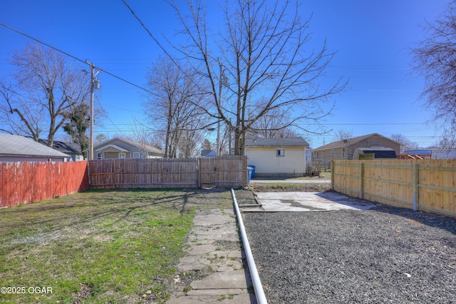 view of yard with a fenced backyard