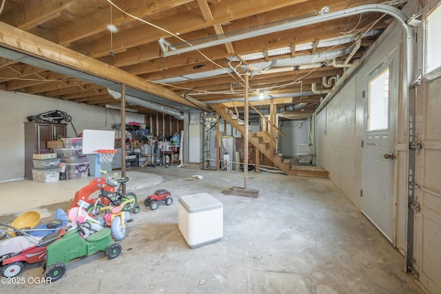 basement featuring stairway