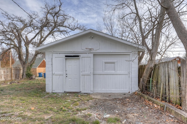 view of outdoor structure with an outdoor structure and fence