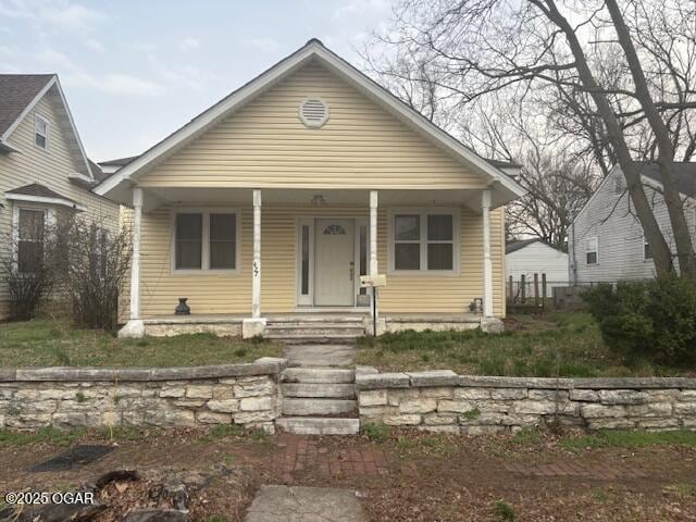 bungalow featuring a porch