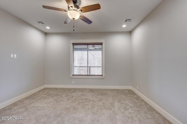 unfurnished room with visible vents, a ceiling fan, recessed lighting, carpet floors, and baseboards