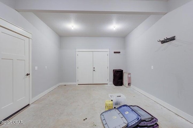 interior space with baseboards