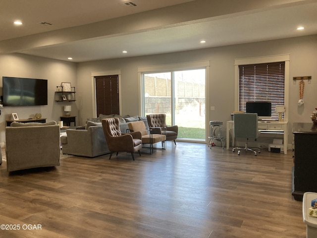 living room featuring recessed lighting and wood finished floors