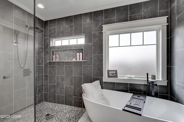 bathroom featuring a soaking tub, crown molding, and walk in shower