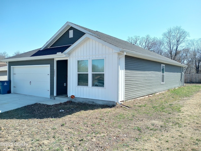 single story home featuring a garage, board and batten siding, and driveway