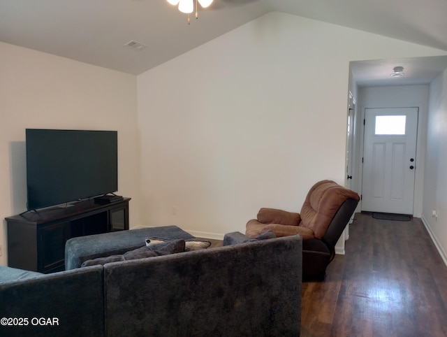 living area featuring a ceiling fan, dark wood-style floors, visible vents, baseboards, and lofted ceiling