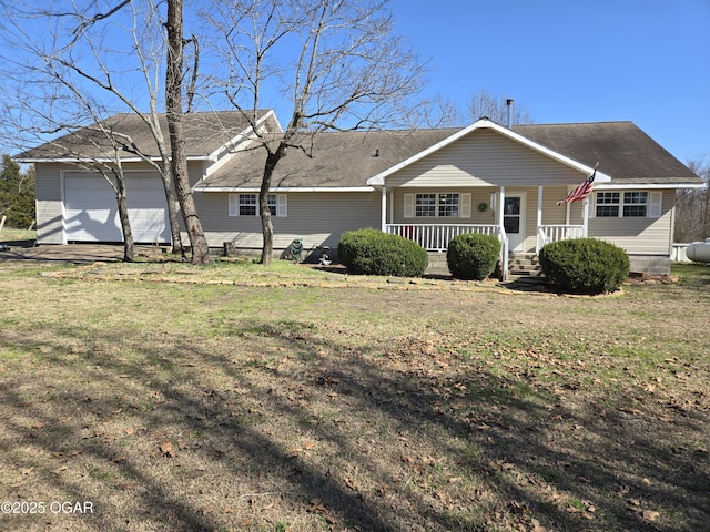 view of front facade featuring a porch, a garage, a front yard, and a shingled roof