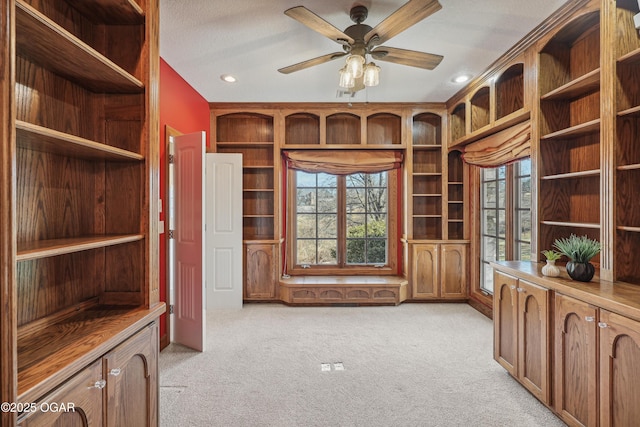 interior space with recessed lighting, visible vents, light carpet, and a ceiling fan