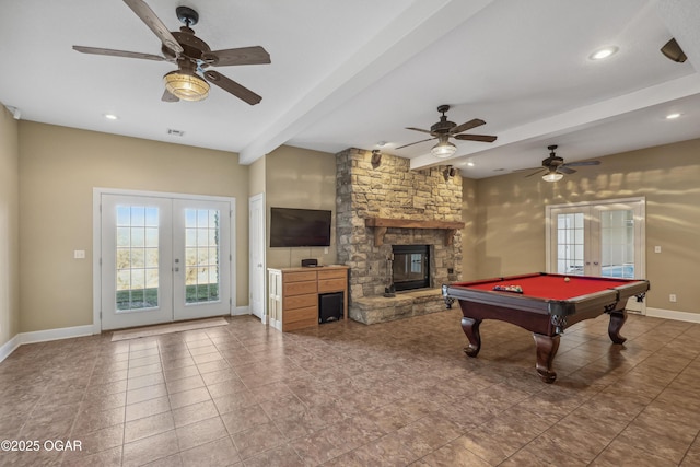 recreation room featuring visible vents, baseboards, beam ceiling, ceiling fan, and french doors