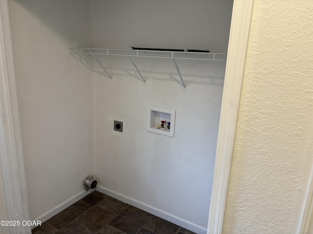 laundry area featuring laundry area, hookup for a washing machine, baseboards, and electric dryer hookup