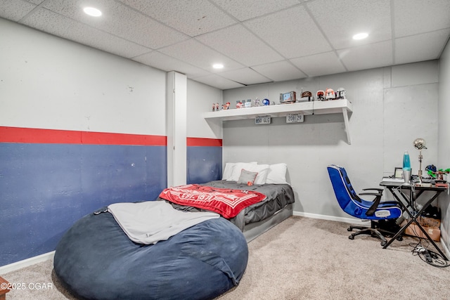 bedroom featuring recessed lighting, a paneled ceiling, baseboards, and carpet floors