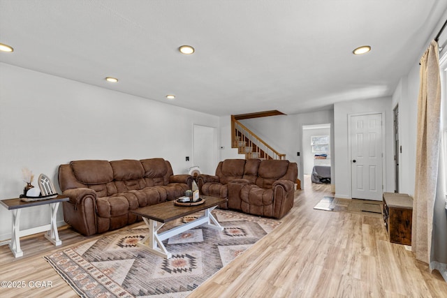 9426 Business 60, Monett, MO 65708 - living area with light wood-style flooring, stairs, and recessed lighting