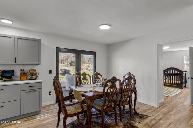 9426 Business 60, Monett, MO 65708 - dining area with a healthy amount of sunlight, visible vents, french doors, and light wood-style floors