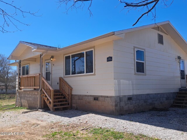 514 S Cole, Granby, MO 64844 - view of front of home featuring crawl space