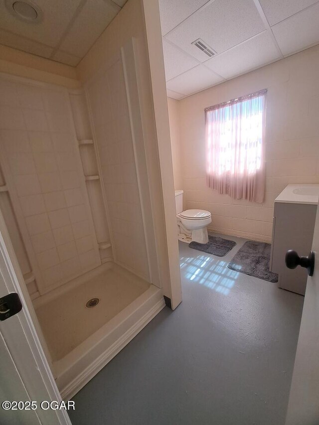 514 S Cole, Granby, MO 64844 - full bath featuring finished concrete flooring, visible vents, washer / clothes dryer, toilet, and a stall shower