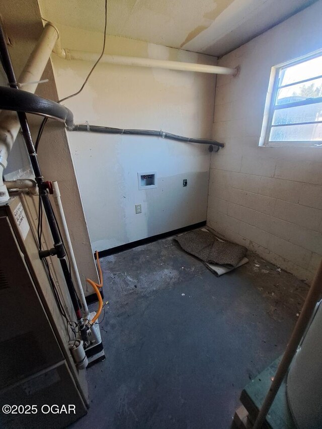 514 S Cole, Granby, MO 64844 - washroom featuring washer hookup, concrete block wall, laundry area, and electric dryer hookup