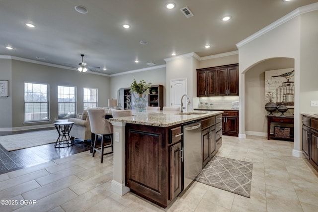 kitchen featuring stainless steel dishwasher, a ceiling fan, visible vents, recessed lighting, and a sink