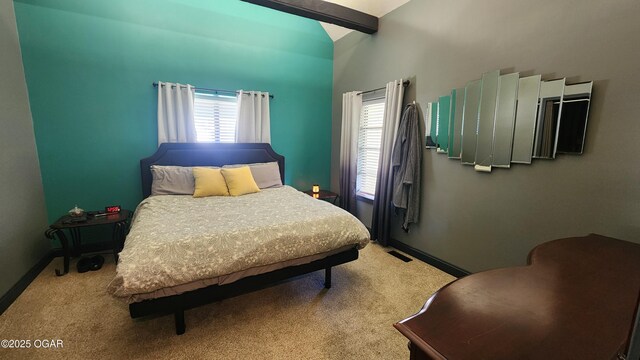 bedroom featuring multiple windows, visible vents, carpet floors, and baseboards