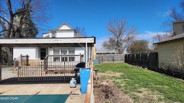 exterior space featuring a fenced backyard