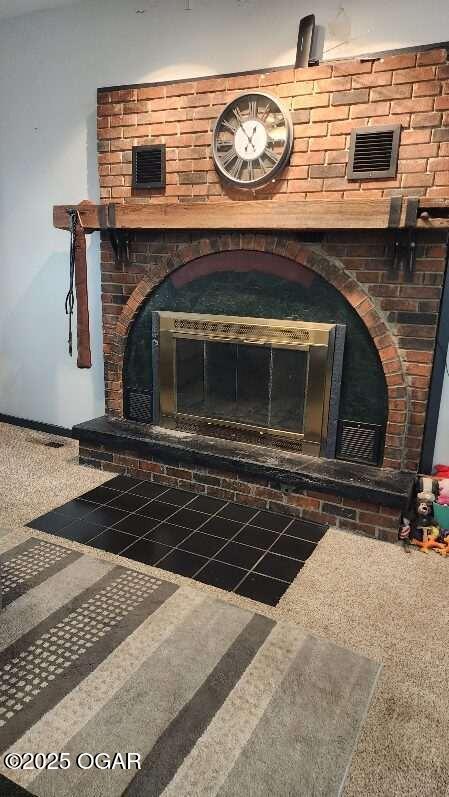 interior details with a fireplace and visible vents