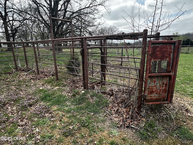 view of gate featuring fence