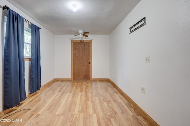 24600 State Highway 96, Webb City, MO 64870 - spare room with light wood finished floors, baseboards, and ceiling fan