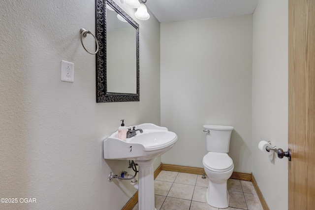 24600 State Highway 96, Webb City, MO 64870 - bathroom with tile patterned flooring, baseboards, and toilet