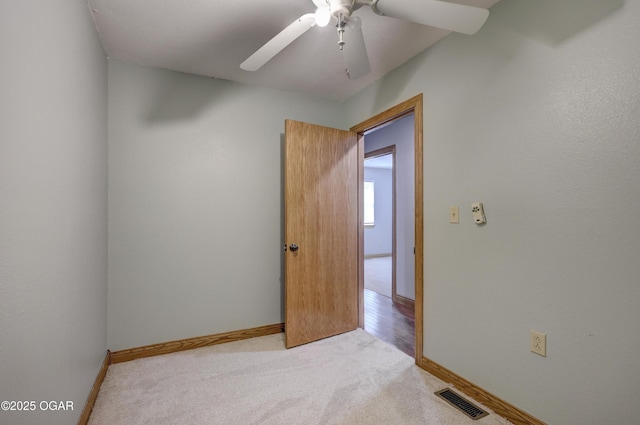 24600 State Highway 96, Webb City, MO 64870 - spare room with light carpet, ceiling fan, baseboards, and visible vents