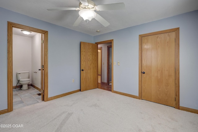 24600 State Highway 96, Webb City, MO 64870 - unfurnished bedroom with a closet, baseboards, carpet flooring, and ensuite bathroom