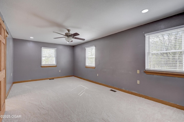 24600 State Highway 96, Webb City, MO 64870 - empty room featuring baseboards, light carpet, recessed lighting, a ceiling fan, and visible vents