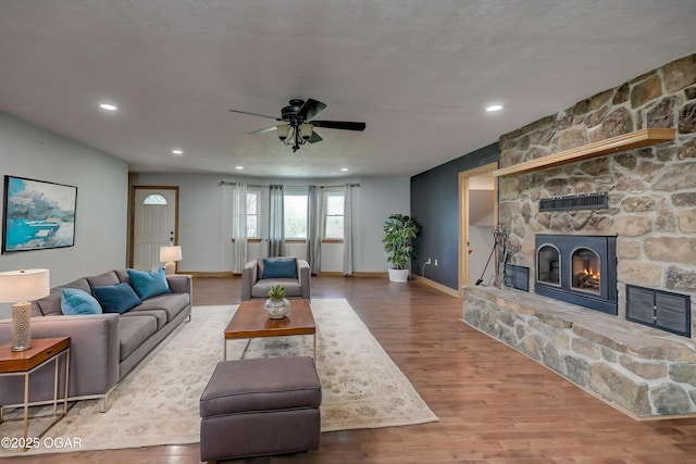 24600 State Highway 96, Webb City, MO 64870 - living room with visible vents, ceiling fan, recessed lighting, and a fireplace