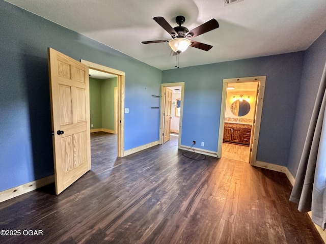 4595 County Road 10, Sarcoxie, MO 64862 - unfurnished bedroom with dark wood finished floors, ensuite bathroom, and a ceiling fan