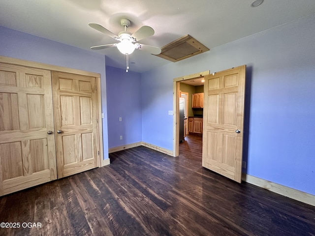 4595 County Road 10, Sarcoxie, MO 64862 - unfurnished bedroom with dark wood-style flooring, a ceiling fan, and freestanding refrigerator