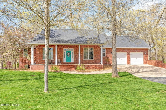 ranch-style house with driveway, an attached garage, a front yard, brick siding, and a shingled roof