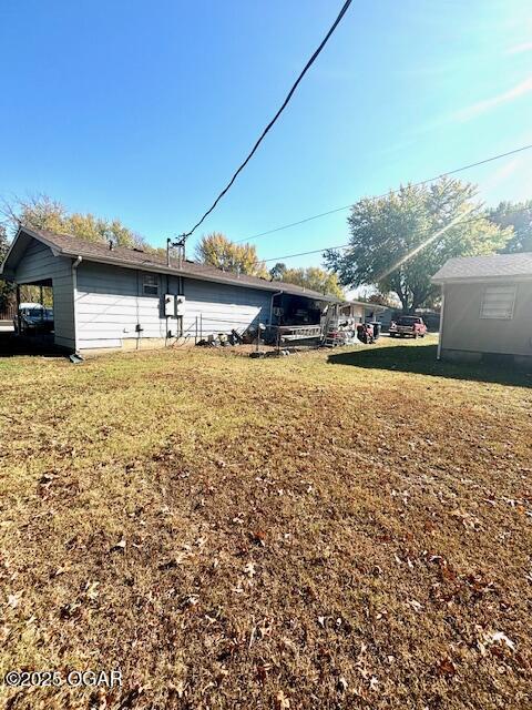 1530 S Oronogo St, Webb City, MO 64870 - view of green lawn
