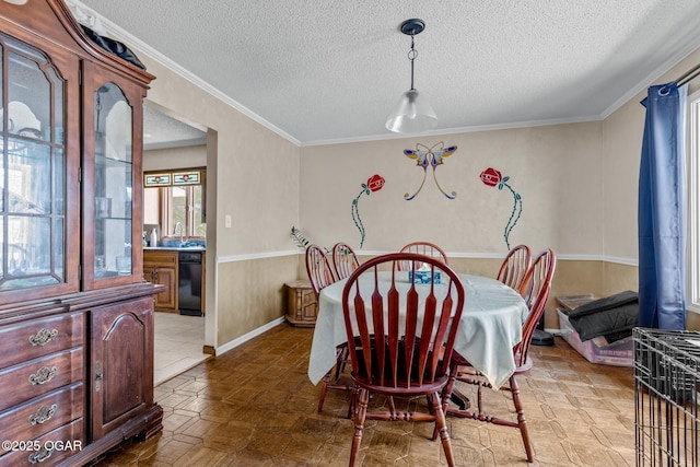 4427 Edgewood Cir, Loma Linda, MO 64804 - dining area with ornamental molding, baseboards, and a textured ceiling