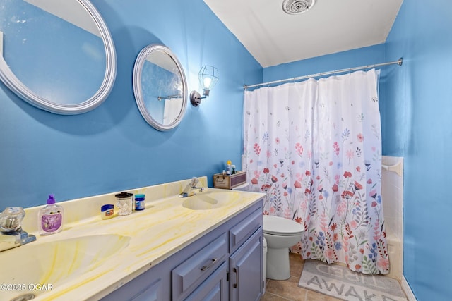 4427 Edgewood Cir, Loma Linda, MO 64804 - bathroom with a sink, tile patterned floors, toilet, and double vanity