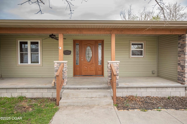 entrance to property featuring covered porch