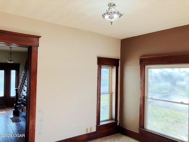 323 W Maple St, Columbus, KS 66725 - empty room with baseboards